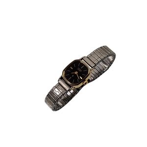 Vintage Citizen Quartz Women’s Gold Tone Black Dial Watch